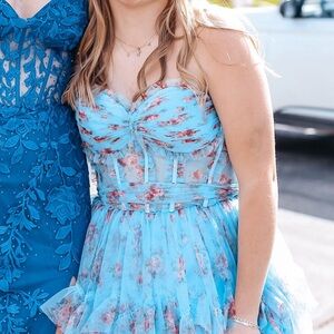 long blue ruffled prom dress
